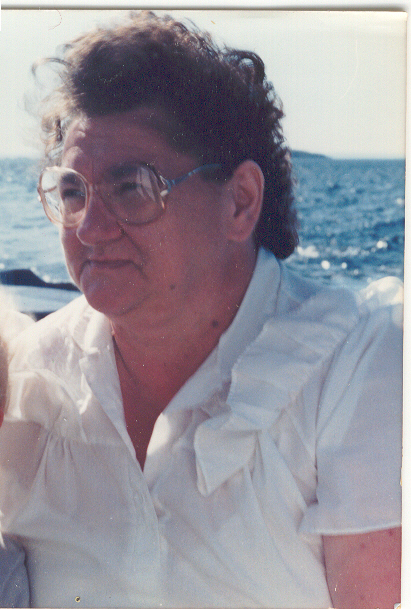 Mom enjoying a day riding in a boat.